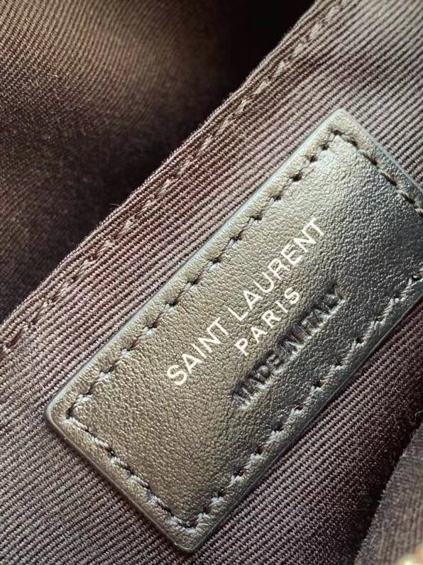 Sa**t Lau*nt vinyle round camera bag in beige grained leather