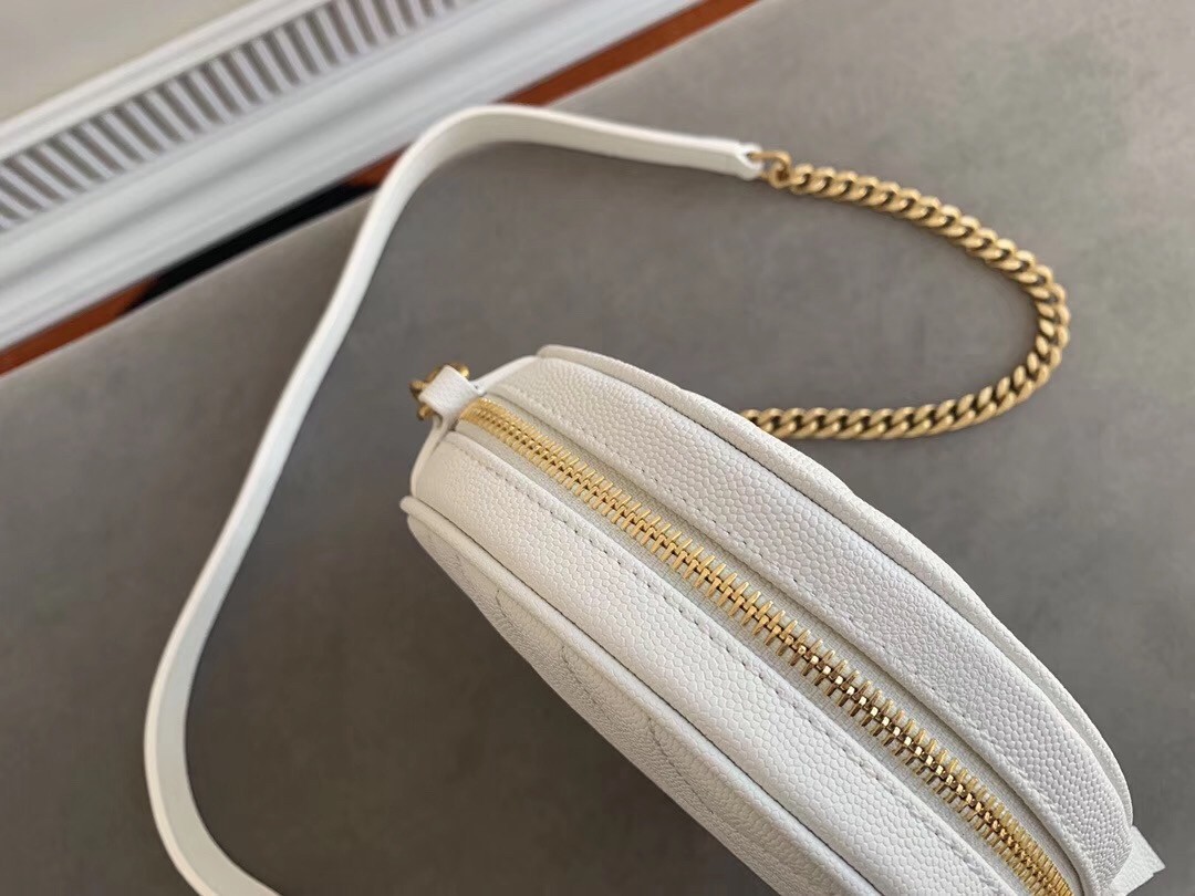 Sa**t Lau*nt vinyle round camera bag in white grained leather