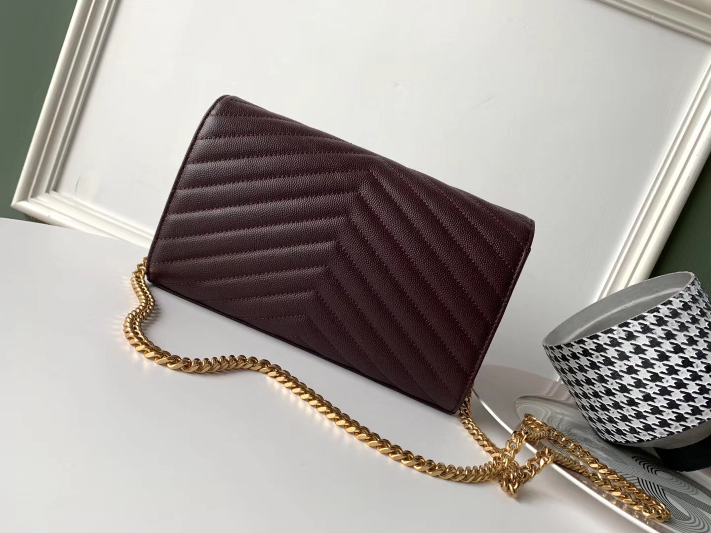 Sa**t Lau*nt woc monogram chain wallet in bordeaux leather