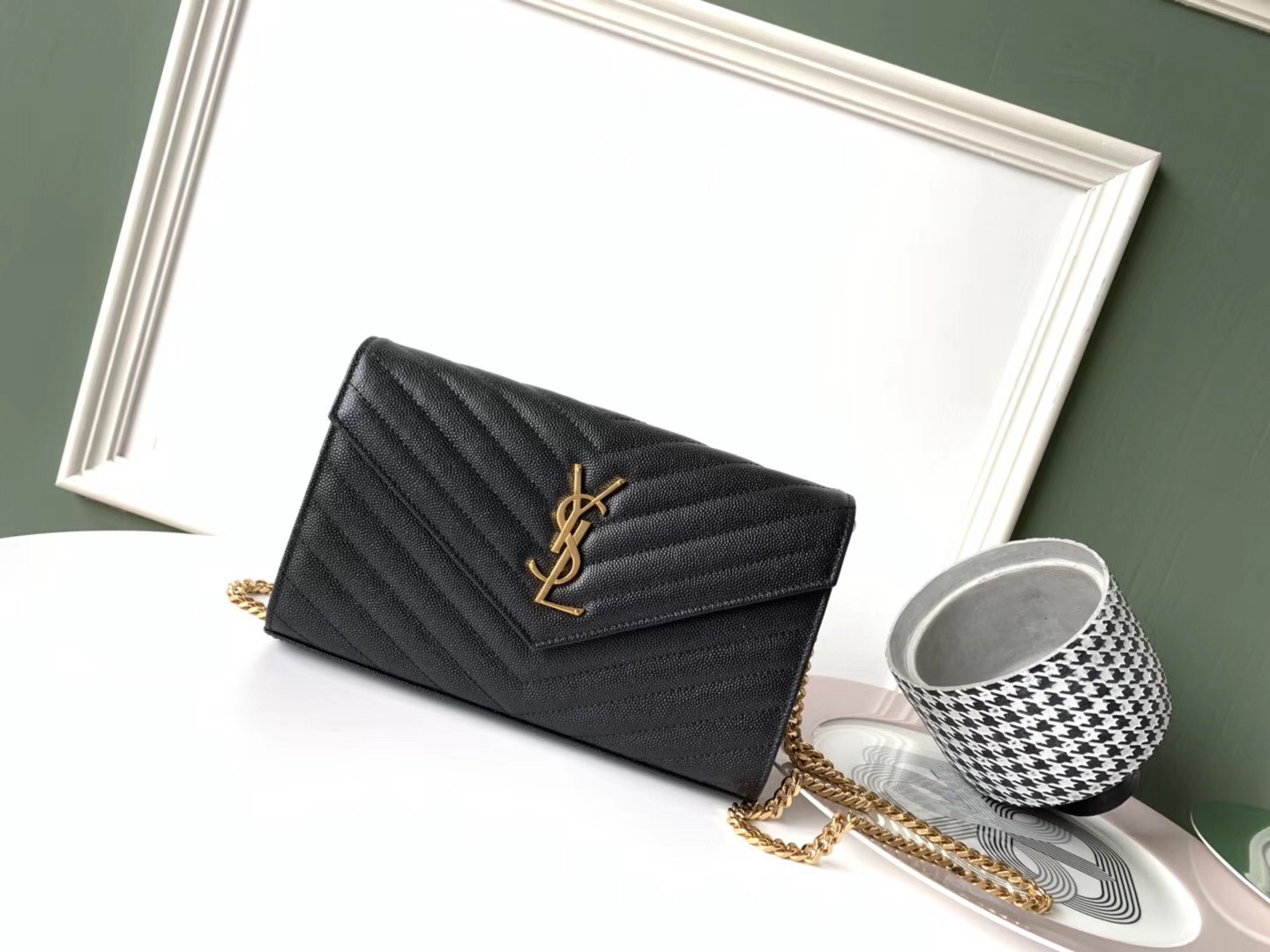 Sa**t Lau*nt woc monogram chain wallet in black leather