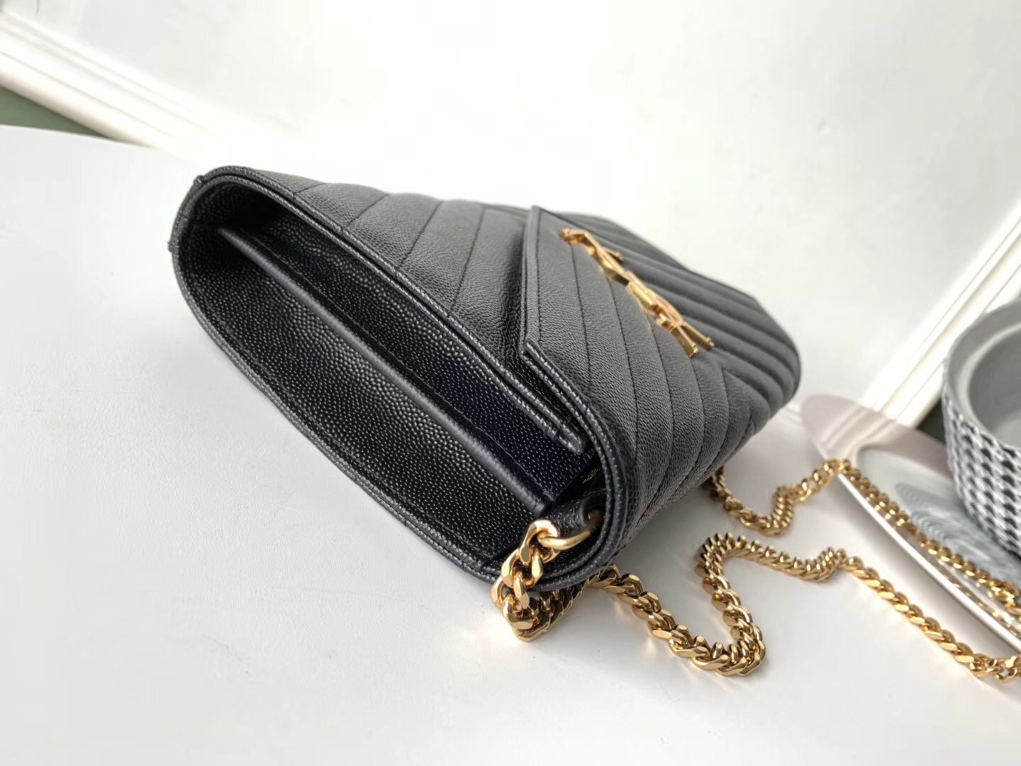 Sa**t Lau*nt woc monogram chain wallet in black leather