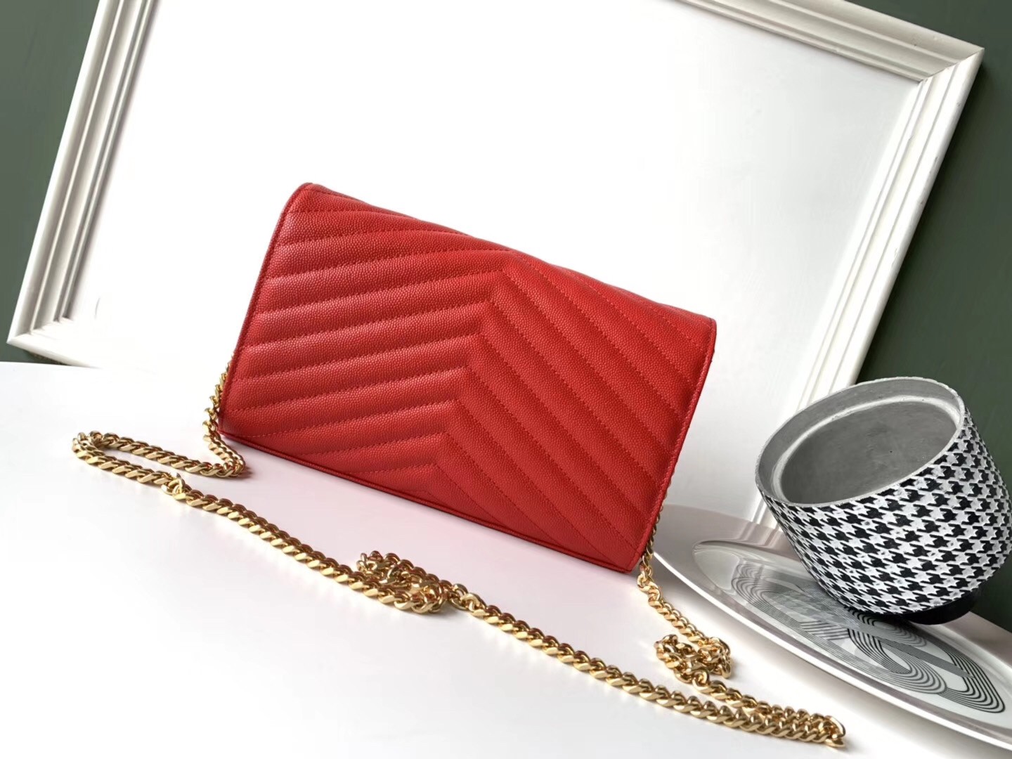 Sa**t Lau*nt woc monogram chain wallet in red leather