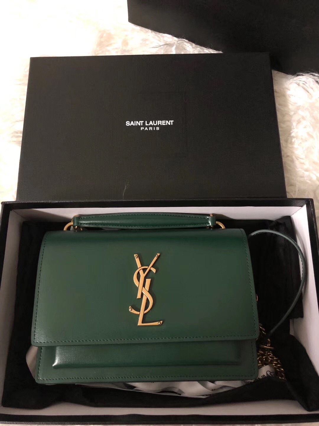 Sa**t Lau*nt woc sunset chain wallet in green calfskin