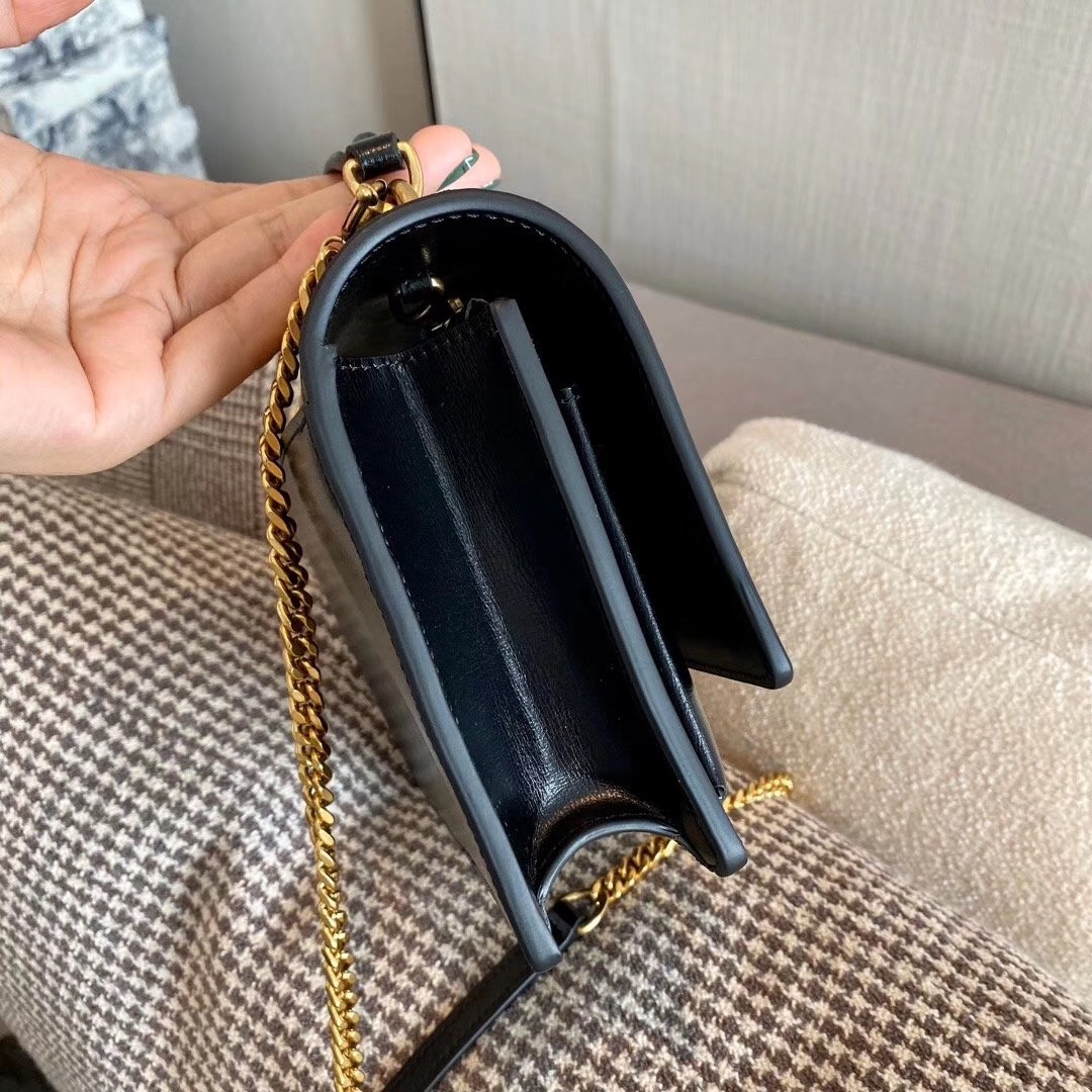 Sa**t Lau*nt woc sunset chain wallet in black calfskin