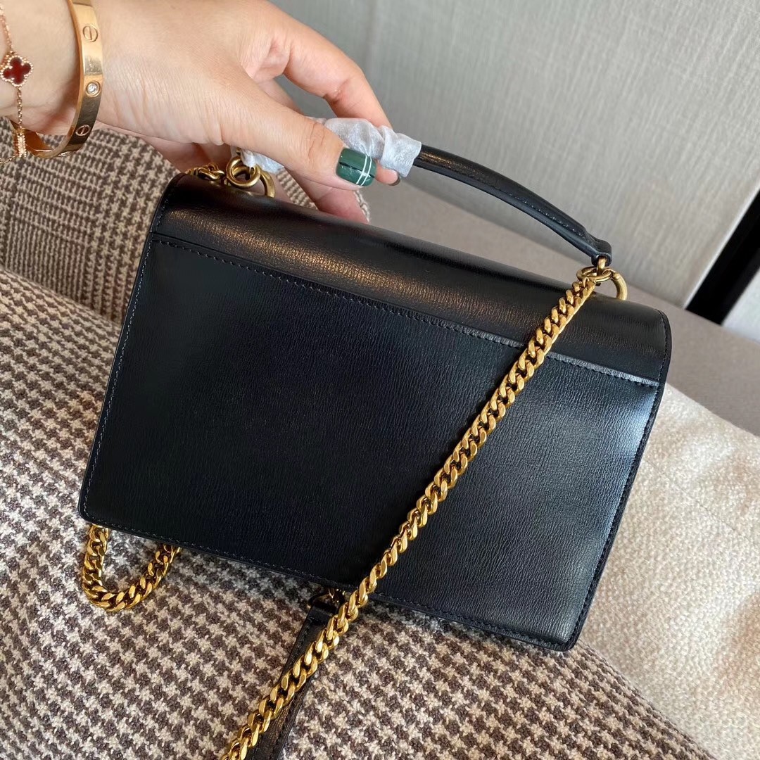 Sa**t Lau*nt woc sunset chain wallet in black calfskin