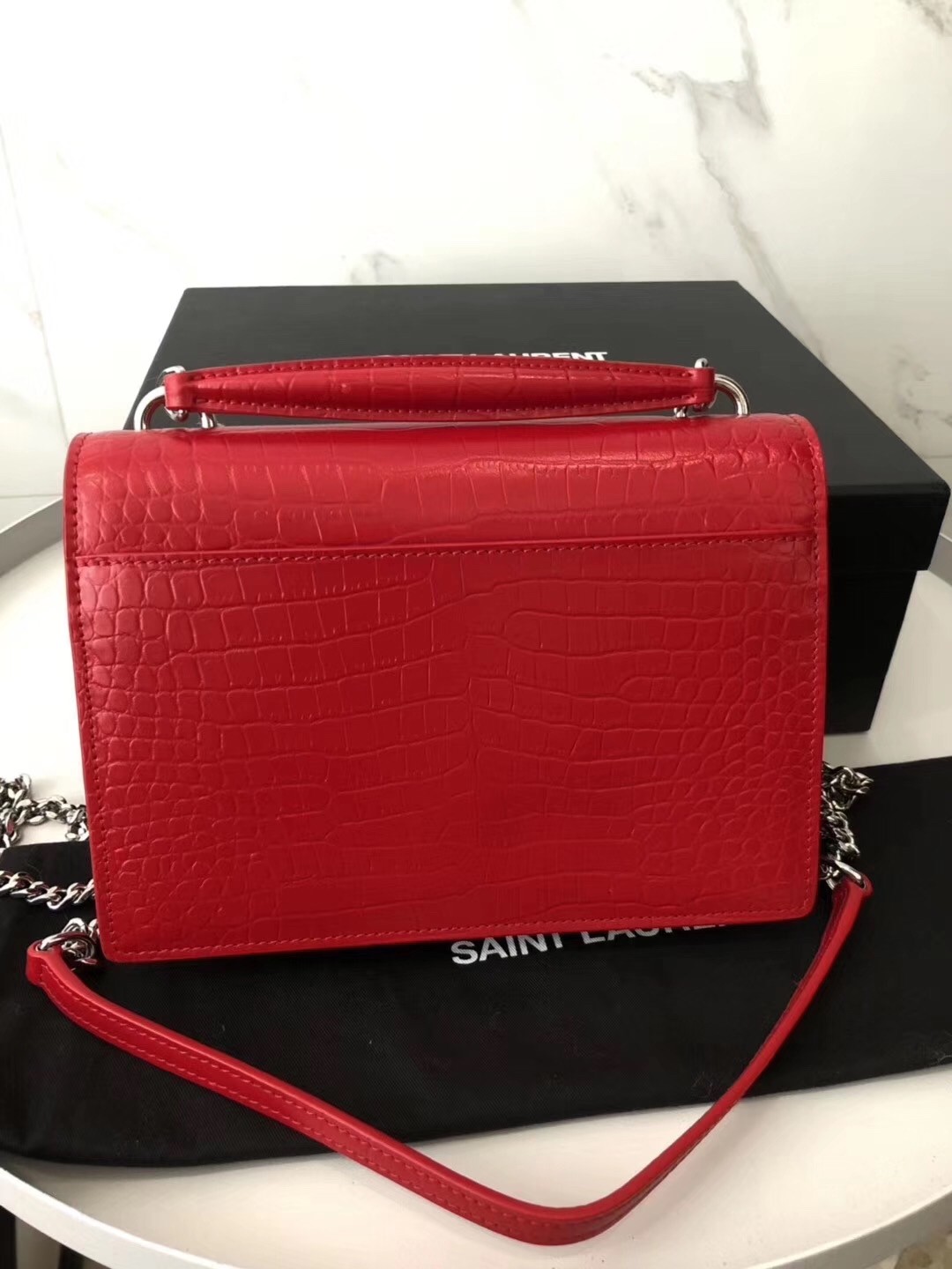 Sa**t Lau*nt woc sunset chain wallet in red croc-embossed leather