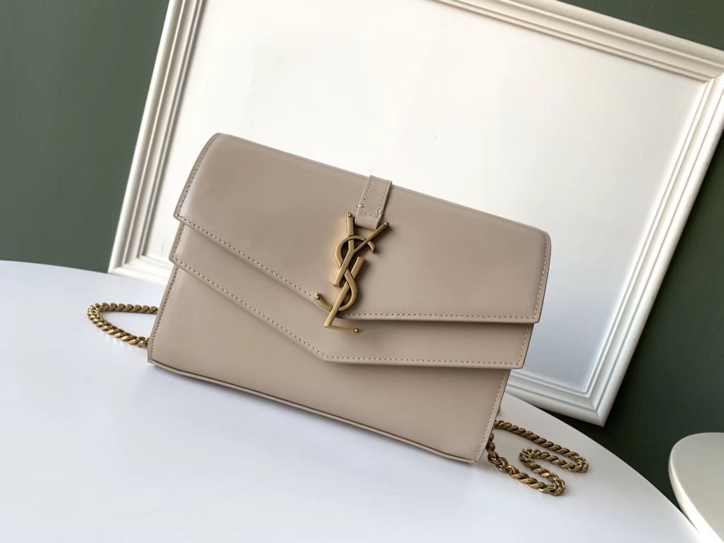 Sa**t Lau*nt woc sulpice chain wallet in beige calfskin