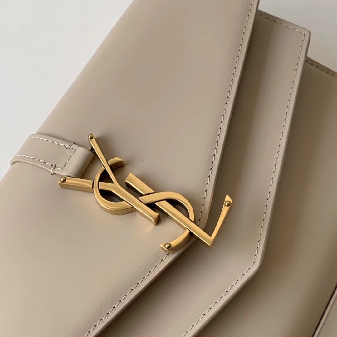 Sa**t Lau*nt woc sulpice chain wallet in beige calfskin
