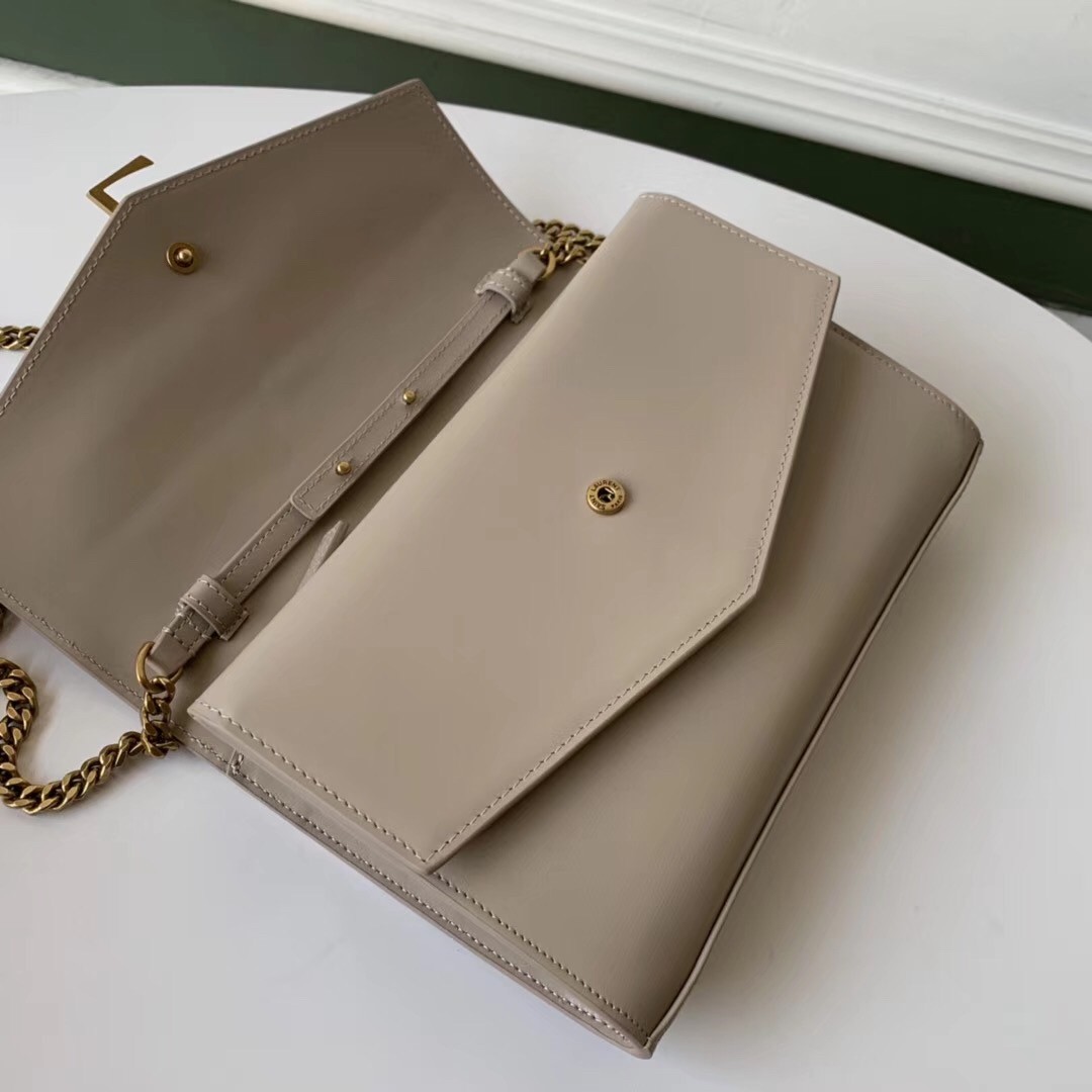 Sa**t Lau*nt woc sulpice chain wallet in beige calfskin
