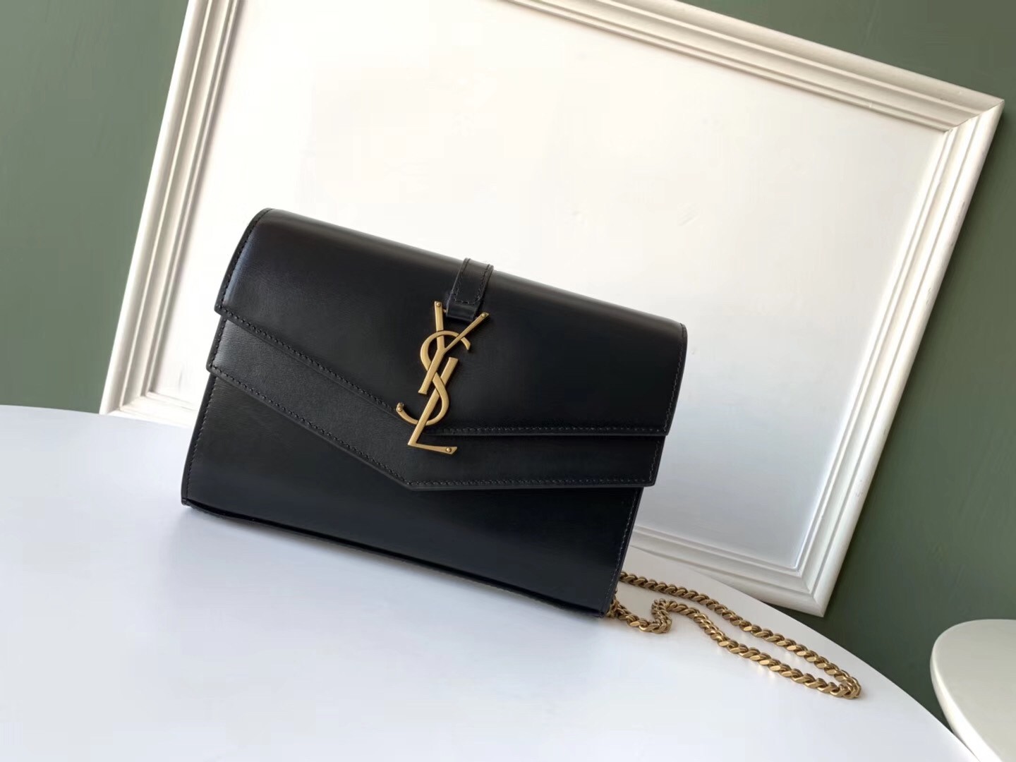 Sa**t Lau*nt woc sulpice chain wallet in black calfskin