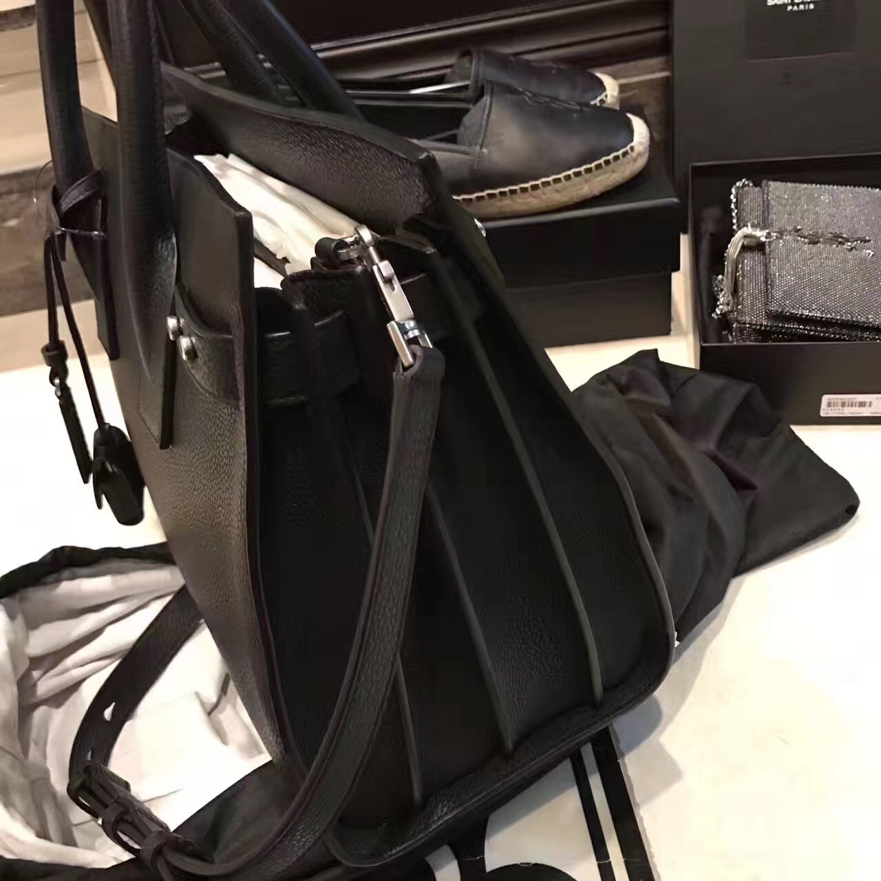 Sa**t Lau*nt small sac de jour souple bag in black grained leather