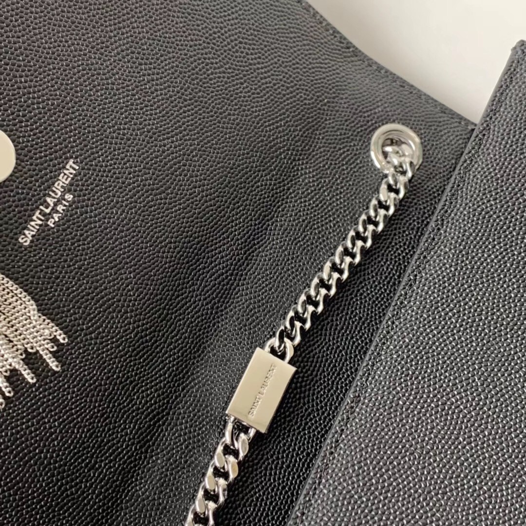 Sa**t Lau*nt small kate tassel bag in black grained leather