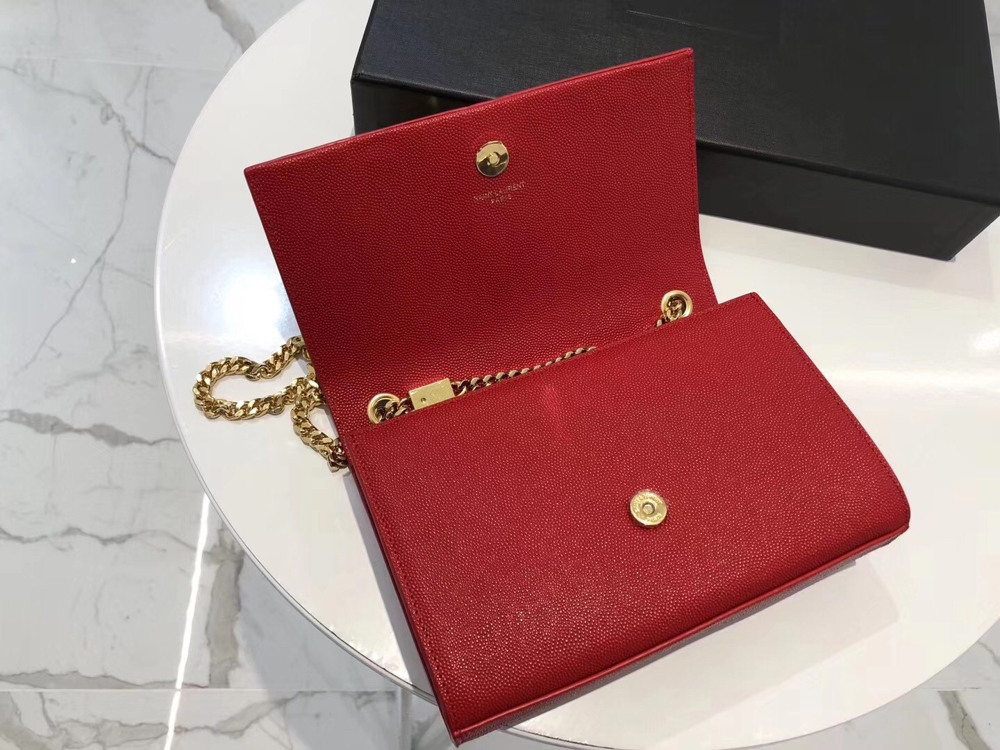 Sa**t Lau*nt small kate tassel bag in red grained leather
