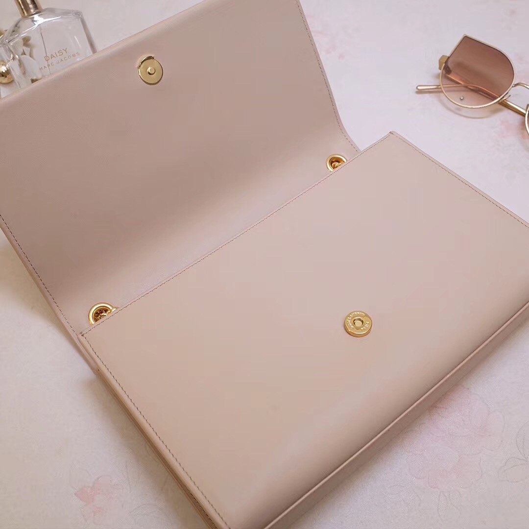 Sa**t Lau*nt medium kate bag with tassel in powder smooth leather