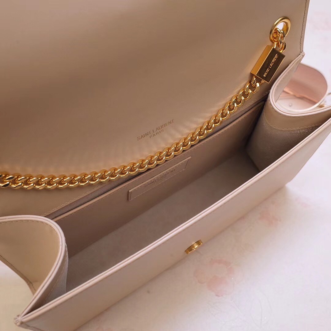 Sa**t Lau*nt medium kate bag with tassel in powder smooth leather