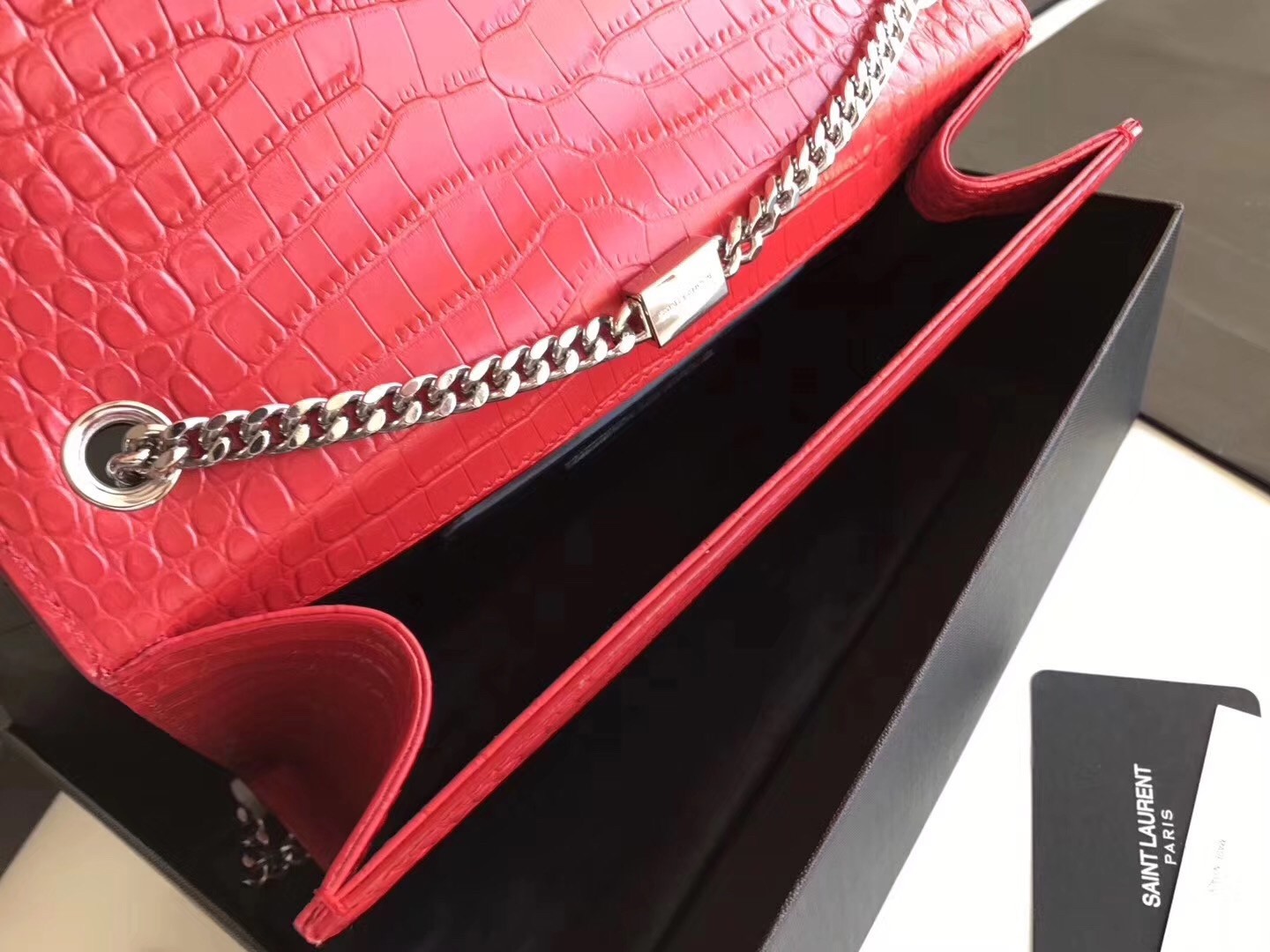 Sa**t Lau*nt medium kate bag with tassel in red croc-embossed leather