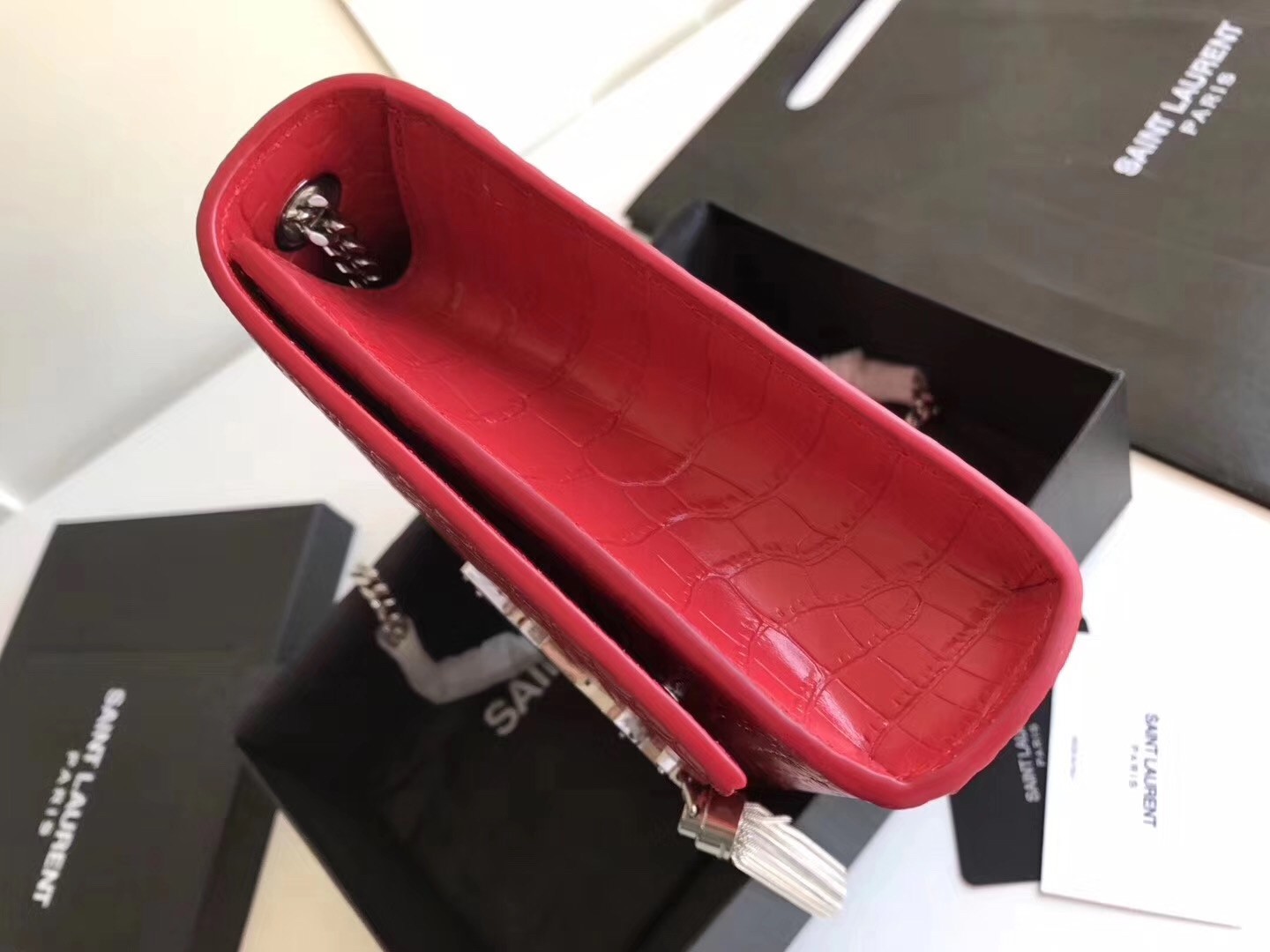 Sa**t Lau*nt medium kate bag with tassel in red croc-embossed leather