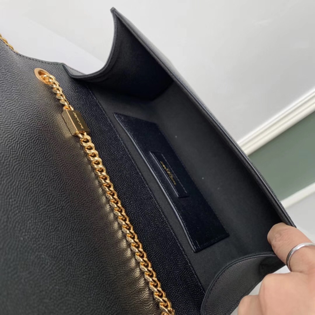 Sa**t Lau*nt medium kate bag with tassel in black grained leather