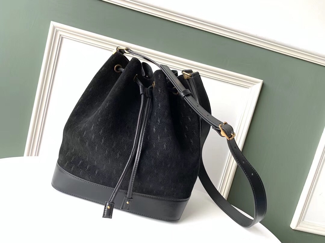 Sa**t Lau*nt monogram all over bucket bag in black suede