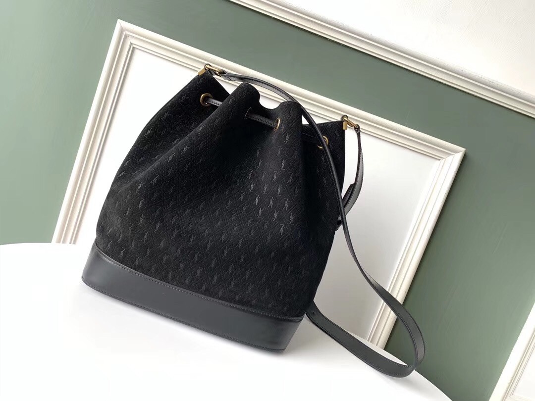 Sa**t Lau*nt monogram all over bucket bag in black suede