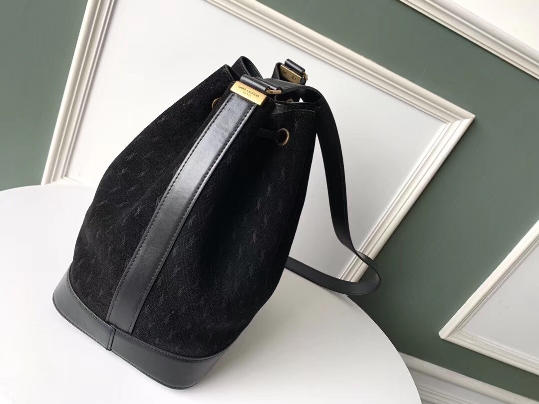 Sa**t Lau*nt monogram all over bucket bag in black suede