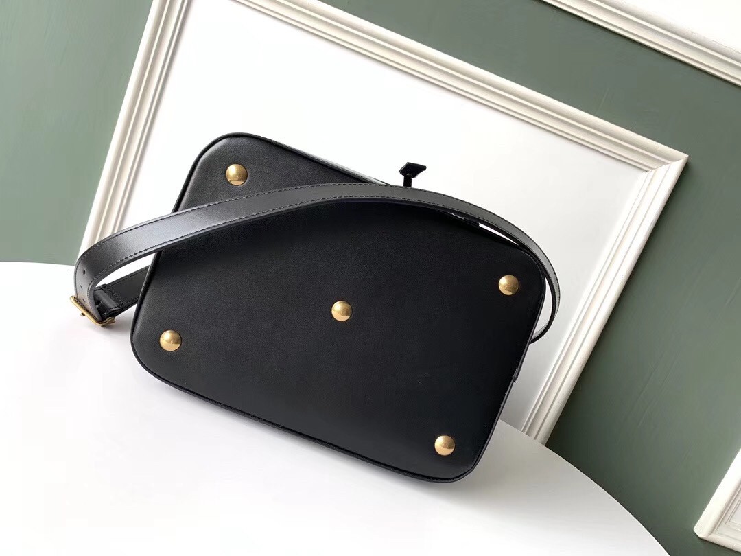 Sa**t Lau*nt monogram all over bucket bag in black suede