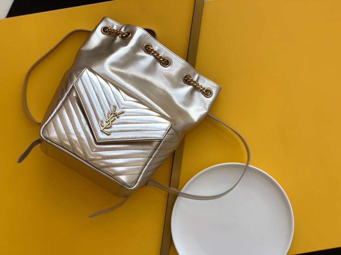 Sa**t Lau*nt joe backpack in gold lame leather