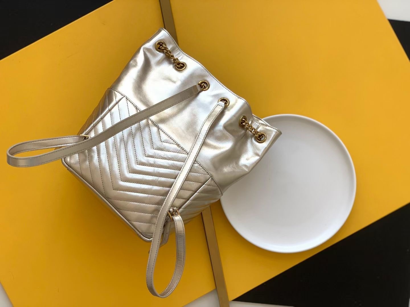Sa**t Lau*nt joe backpack in gold lame leather