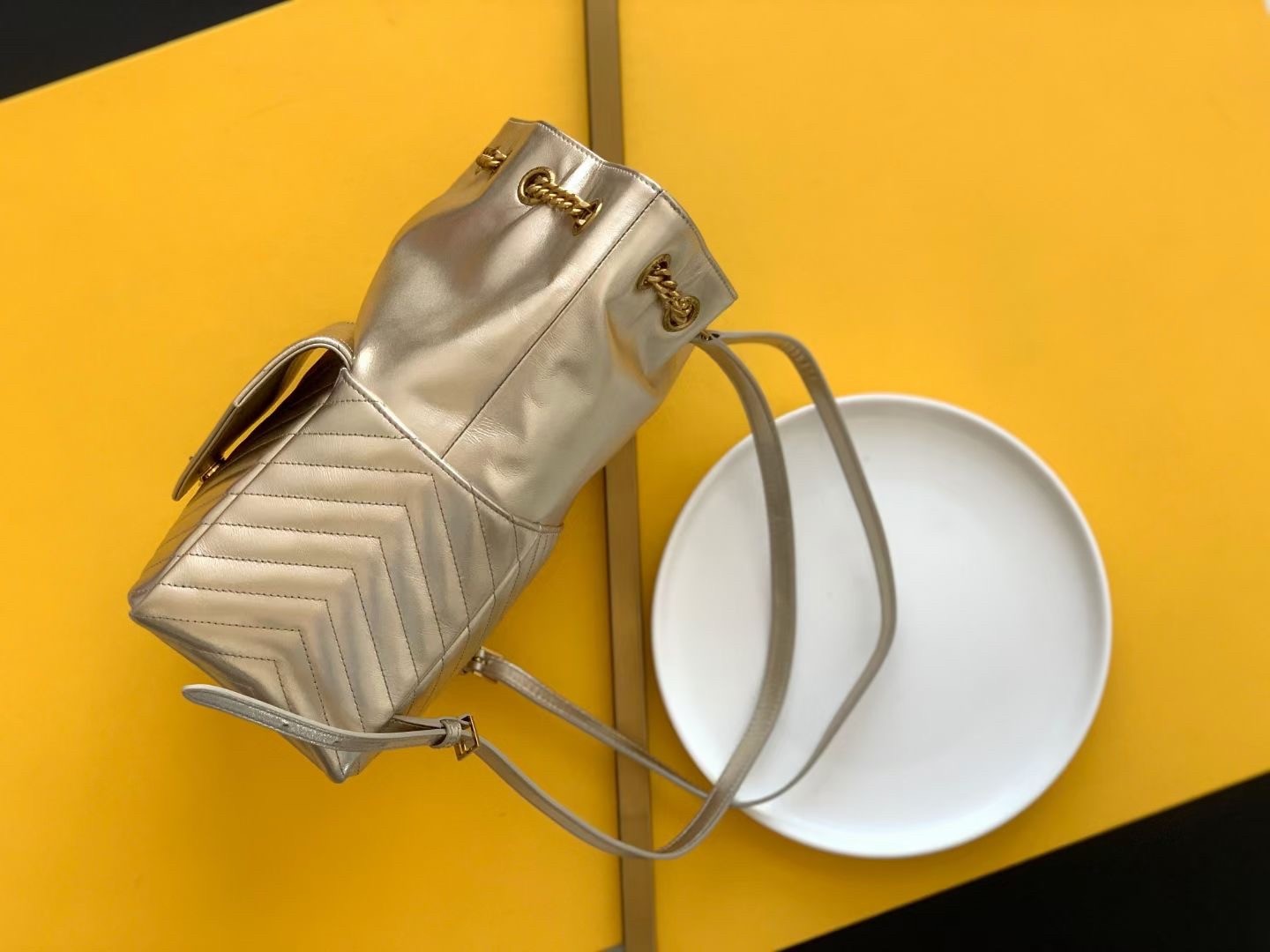 Sa**t Lau*nt joe backpack in gold lame leather