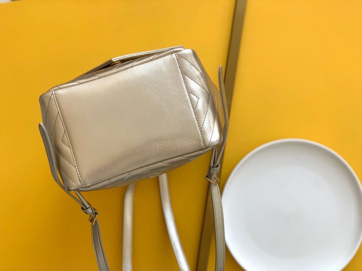 Sa**t Lau*nt joe backpack in gold lame leather