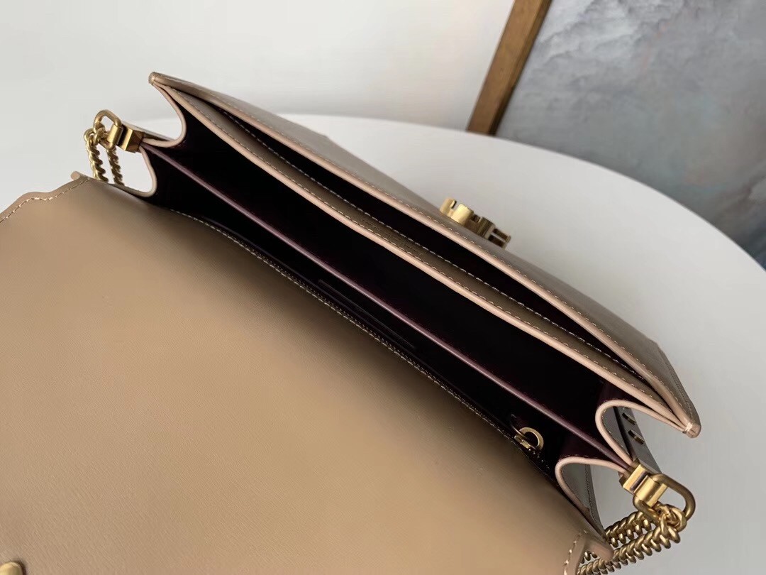 Sa**t Lau*nt camel cassandra monogram clasp bag