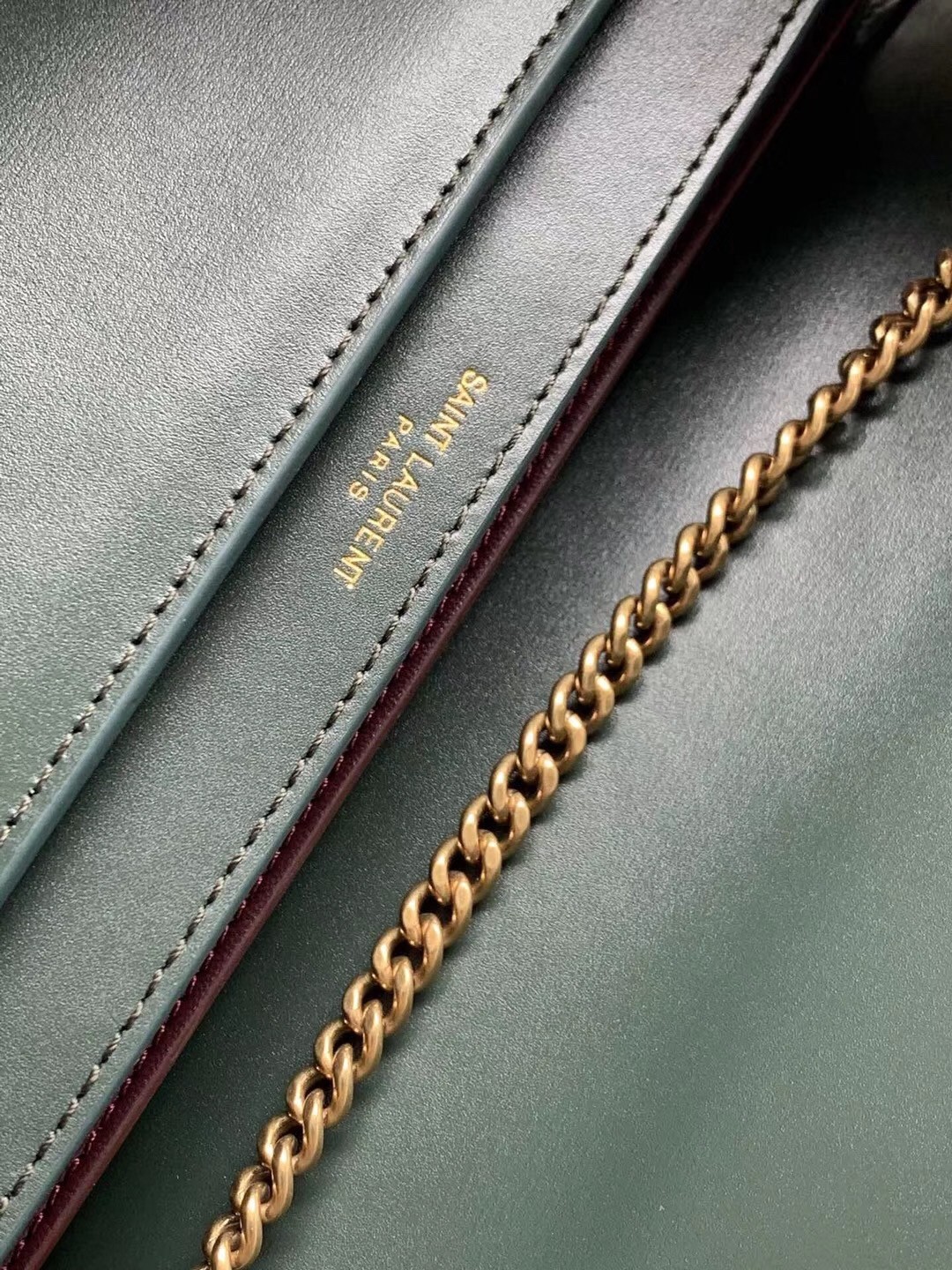 Sa**t Lau*nt dark green cassandra monogram clasp bag
