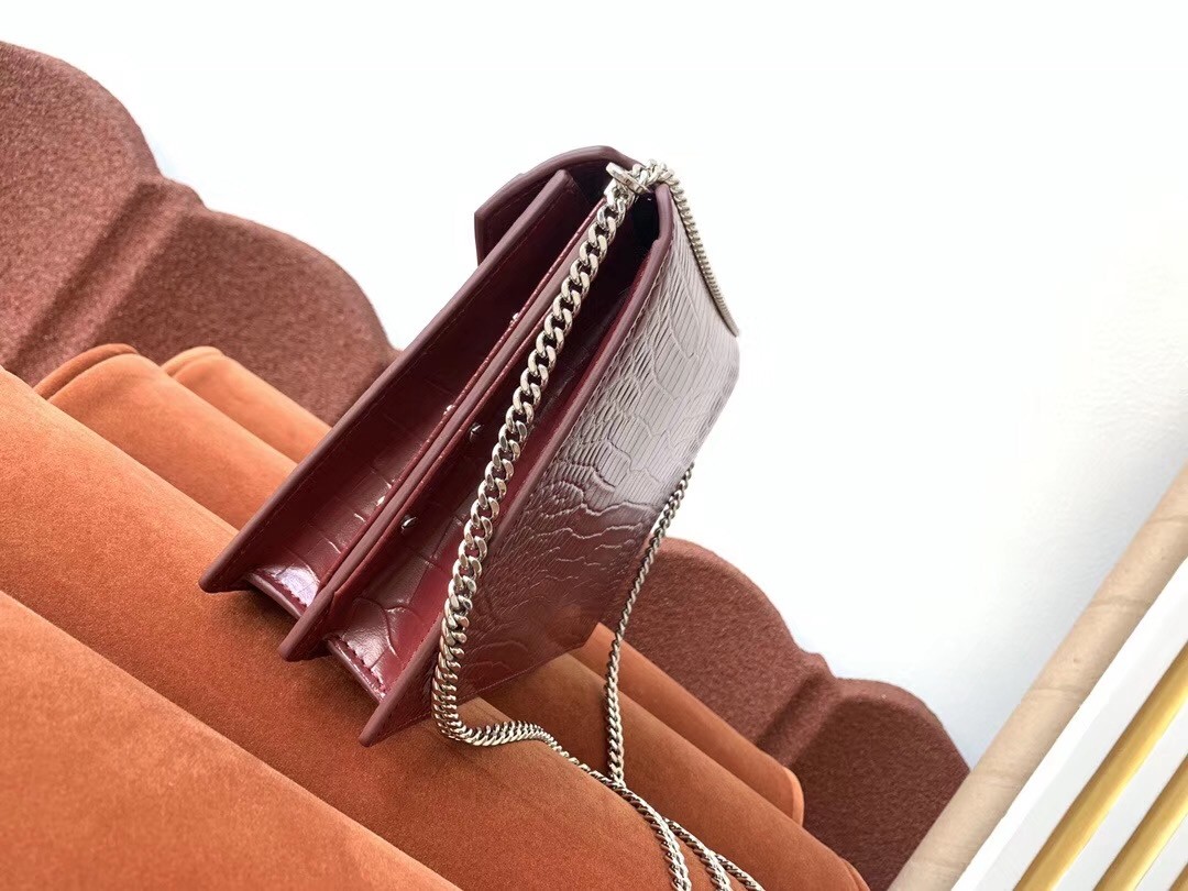 Sa**t Lau*nt cassandra clasp bag in bordeaux croc-embossed leather