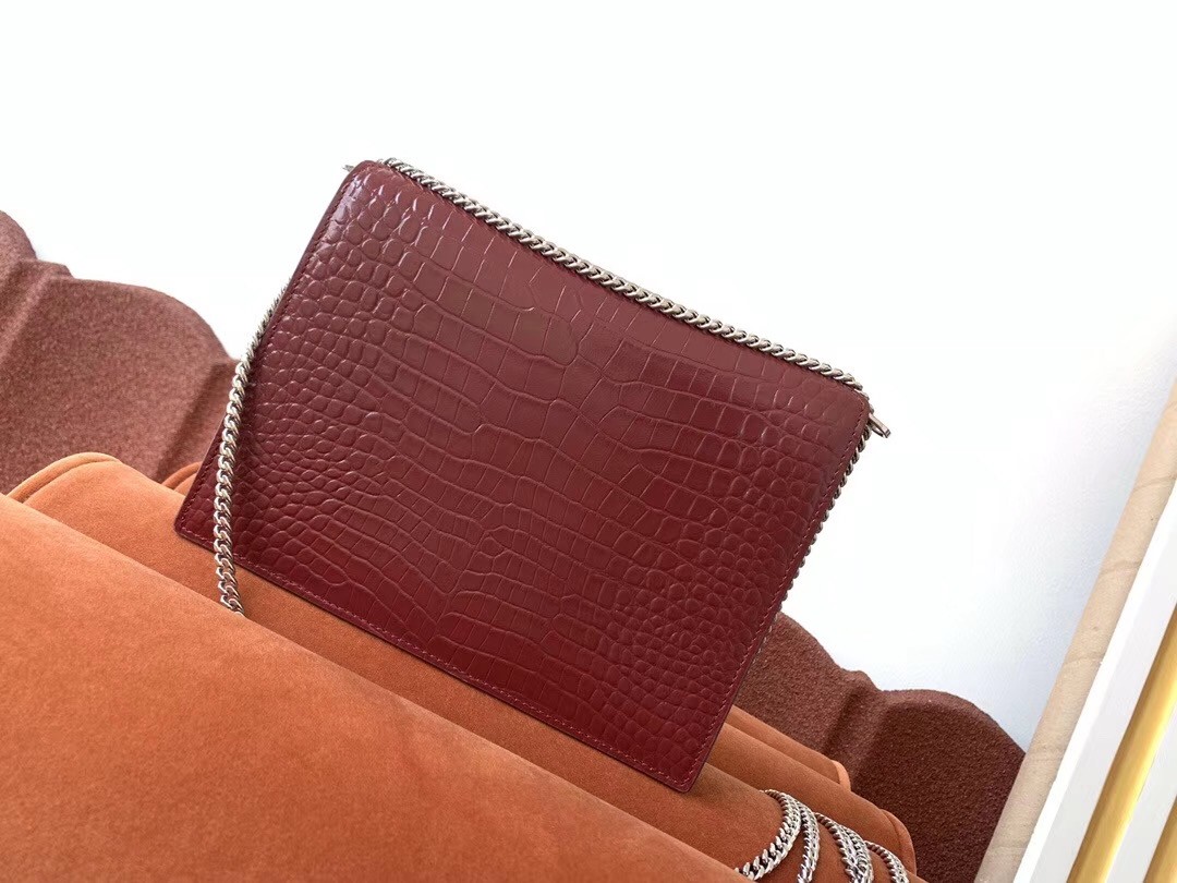 Sa**t Lau*nt cassandra clasp bag in bordeaux croc-embossed leather