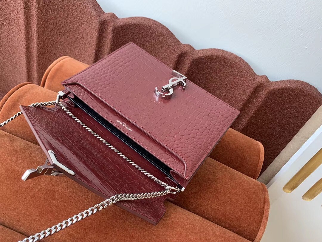 Sa**t Lau*nt cassandra clasp bag in bordeaux croc-embossed leather