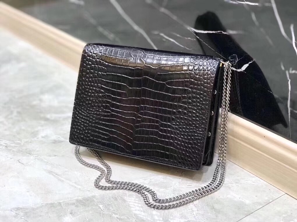 Sa**t Lau*nt cassandra clasp bag in black croc-embossed leather