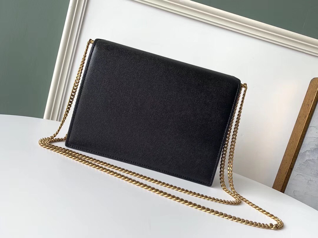 Sa**t Lau*nt cassandra clasp bag in black grained leather