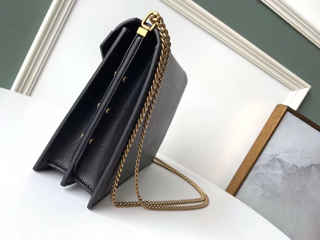 Sa**t Lau*nt cassandra clasp bag in black grained leather