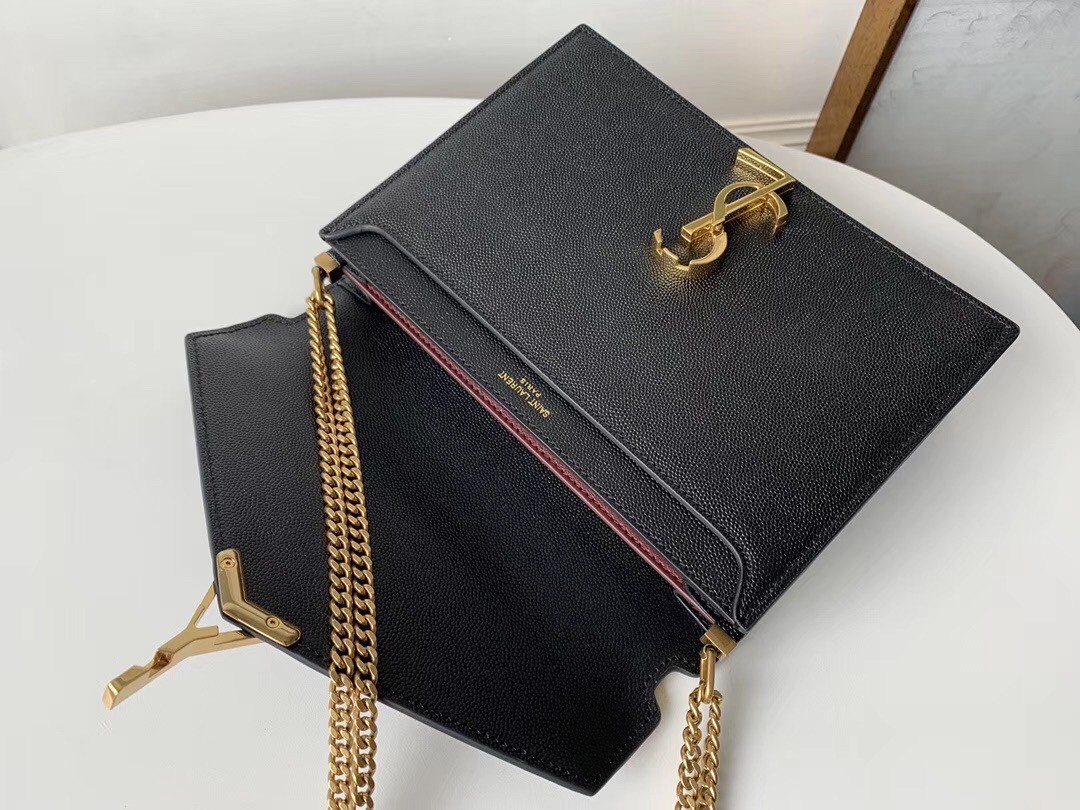 Sa**t Lau*nt cassandra clasp bag in black grained leather