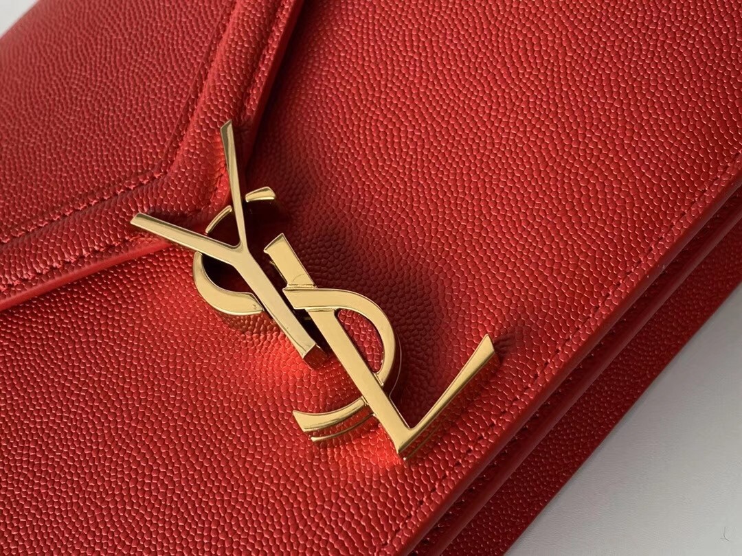 Sa**t Lau*nt cassandra clasp bag in red grained leather