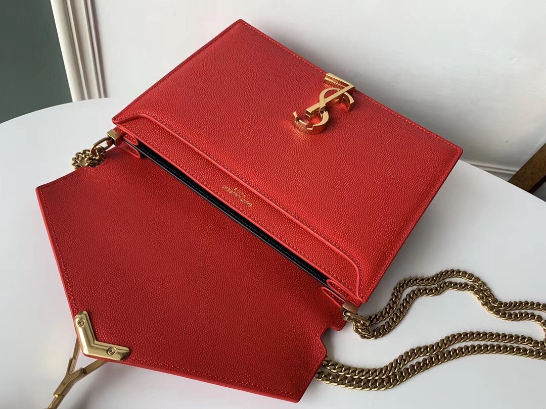 Sa**t Lau*nt cassandra clasp bag in red grained leather