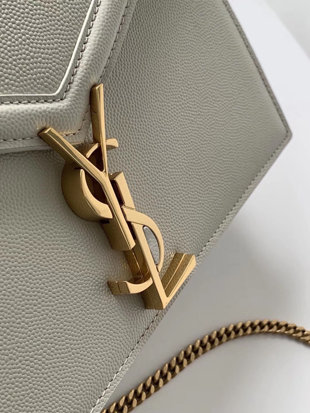 Sa**t Lau*nt cassandra clasp bag in blanc grained leather