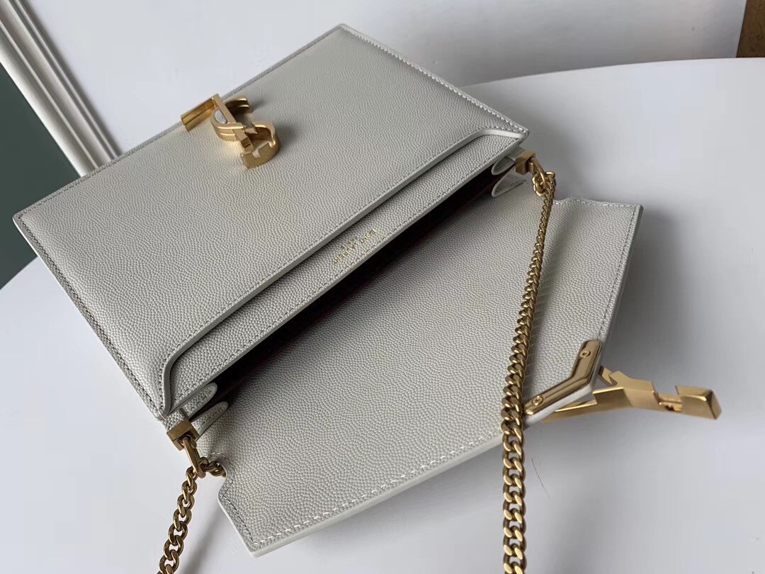 Sa**t Lau*nt cassandra clasp bag in blanc grained leather