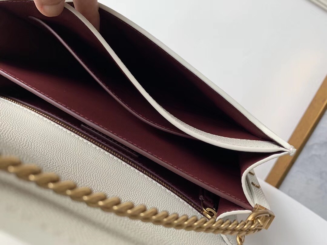 Sa**t Lau*nt cassandra clasp bag in blanc grained leather