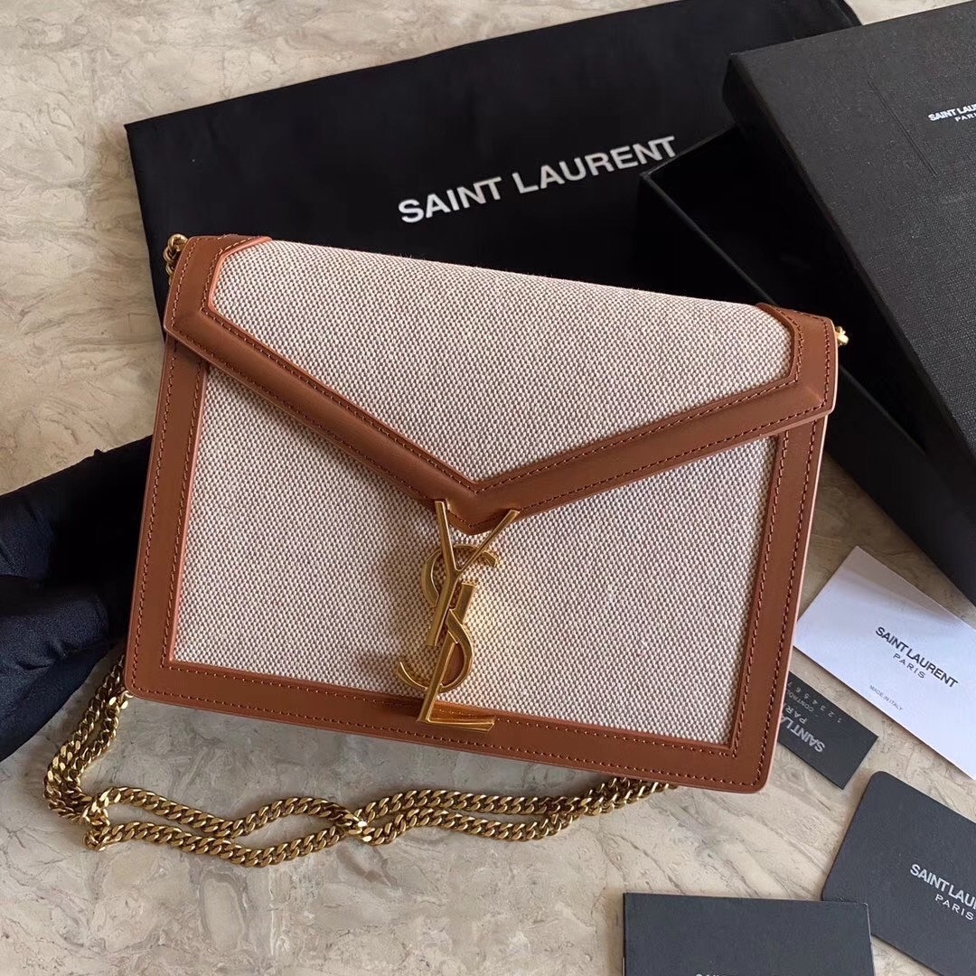 Sa**t Lau*nt cassandra clasp bag in beige canvas