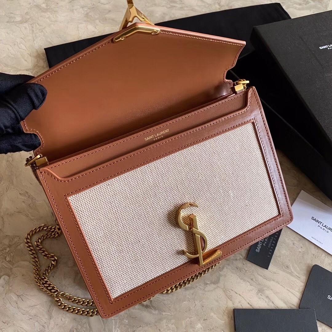 Sa**t Lau*nt cassandra clasp bag in beige canvas