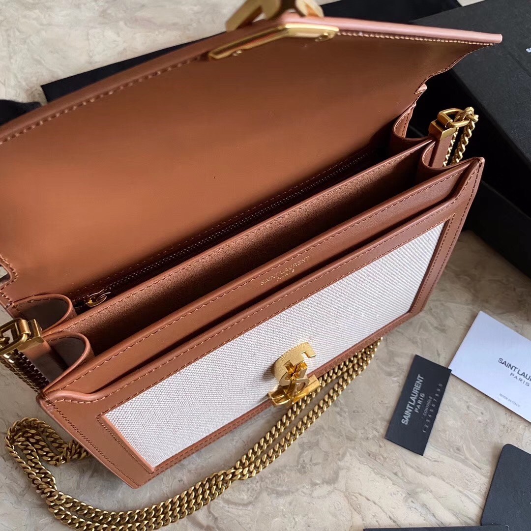 Sa**t Lau*nt cassandra clasp bag in beige canvas