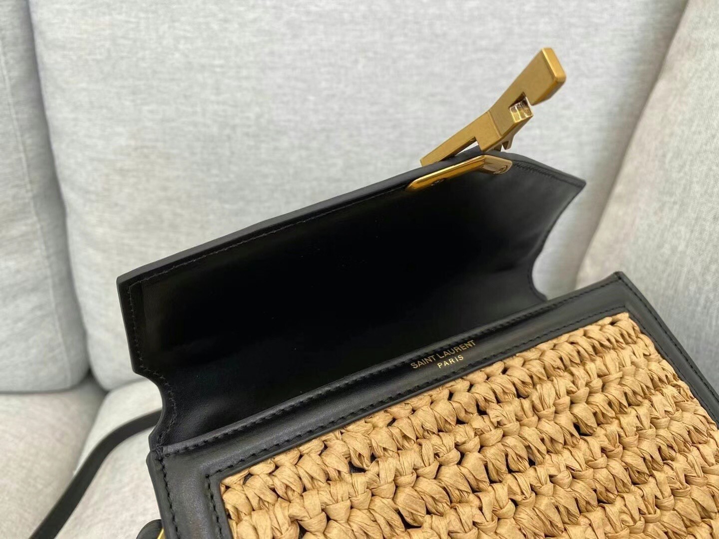Sa**t Lau*nt cassandra mini top handle bag in raffia