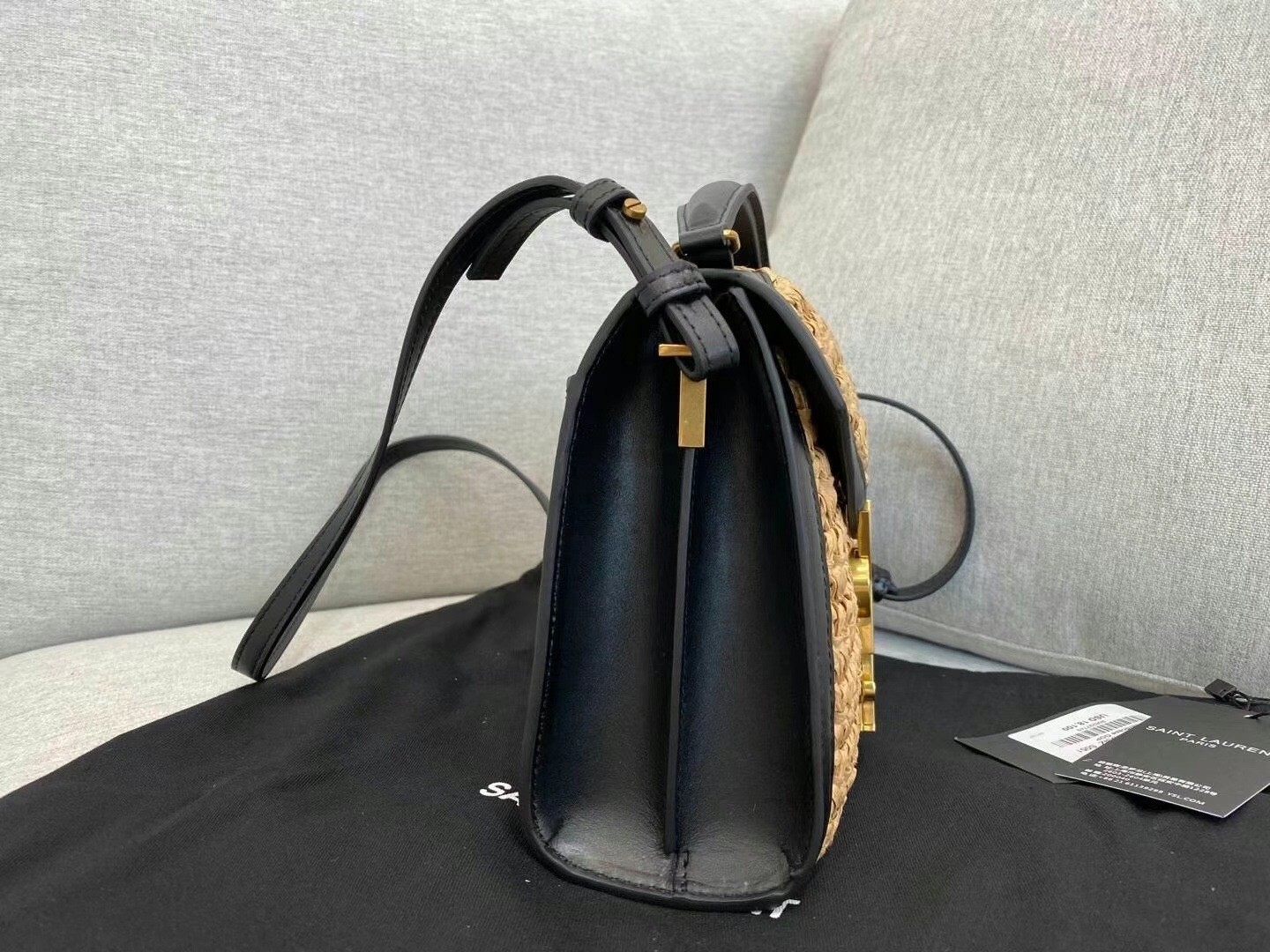 Sa**t Lau*nt cassandra mini top handle bag in raffia