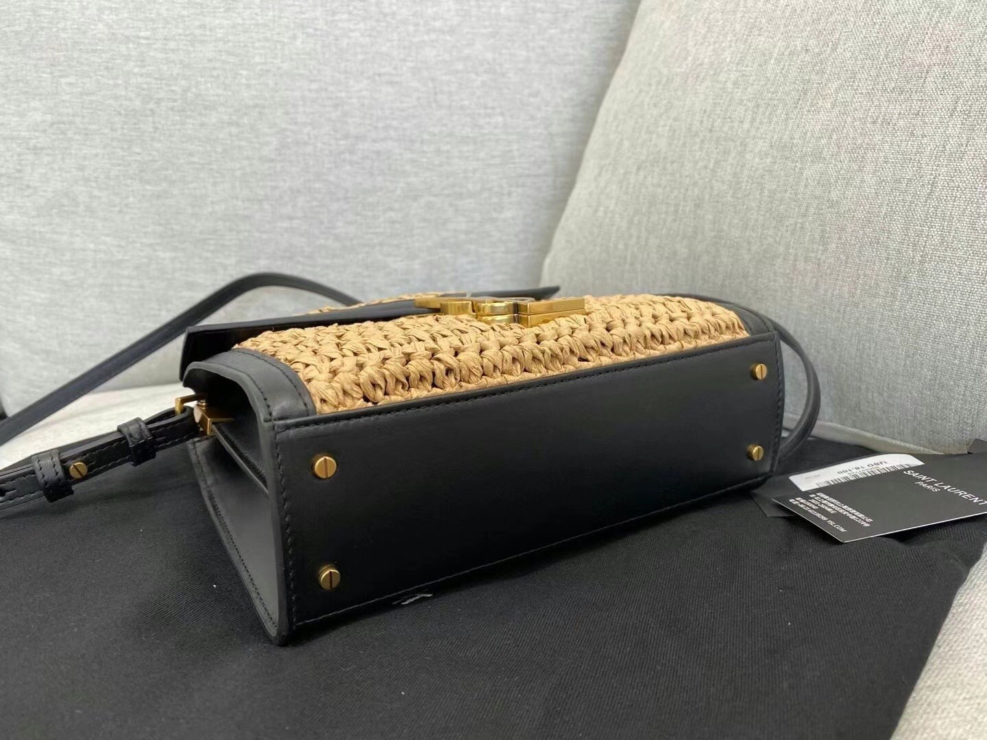 Sa**t Lau*nt cassandra mini top handle bag in raffia